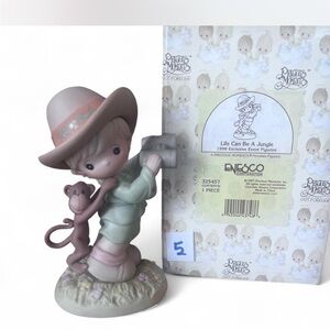 Precious Moments ‘Life can be a Jungle’ figurine.